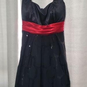 Black dress with red waist band size 7